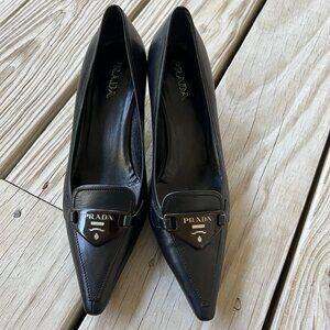 Prada kitten heels vintage black leather brown logo plate 37.5 7 pointed toe